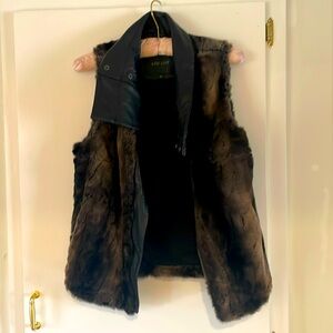 Fur and leather vest.